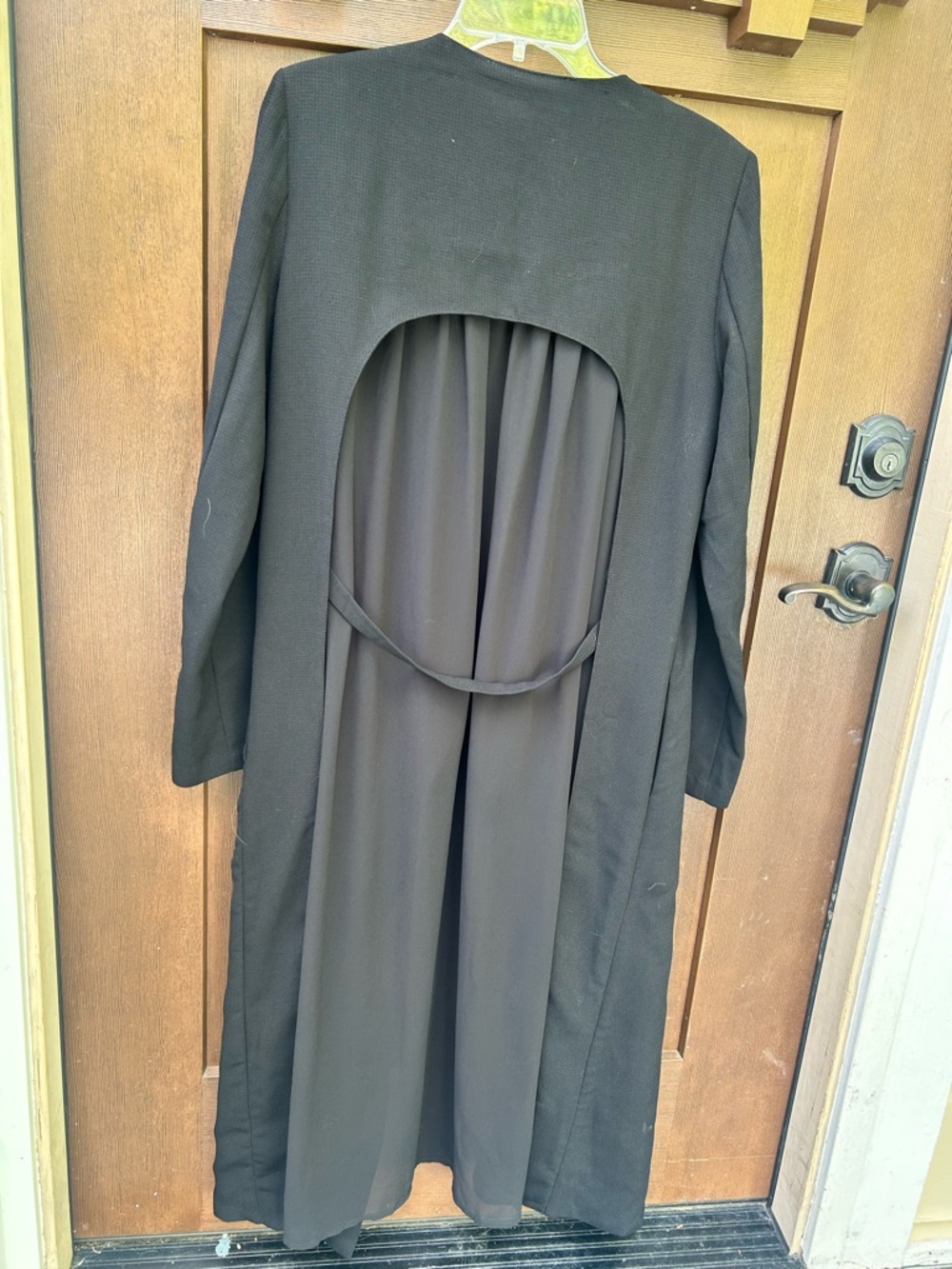 Long Duster with Prominent Open-Back Cut-Out